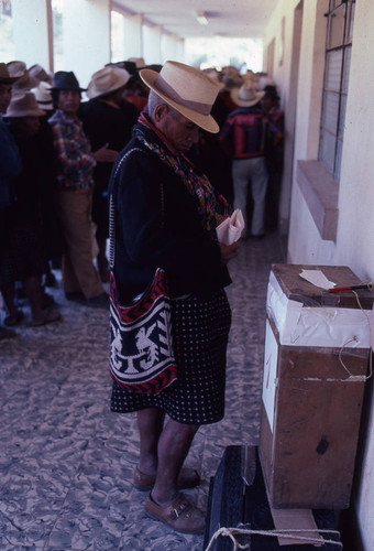 Mayan man voting on election day, Nahualá, 1982