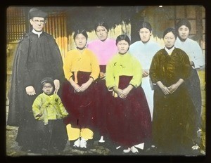 Group portrait of Fr. John E. Morris, MM, and six Korean women, Korea, ca. 1920-1940