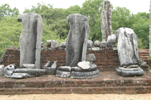 Image house: Standing Buddha statues