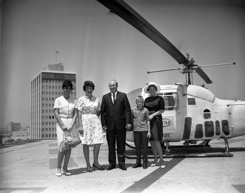 Howell family at helicopter, Los Angeles