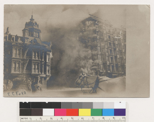 [Burning of Grand (left) and Palace Hotels, Market St. at New Montgomery. Postcard.]