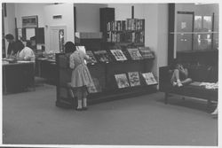 Patrons using the Dagny Juell Boys and Girls Room of the Library