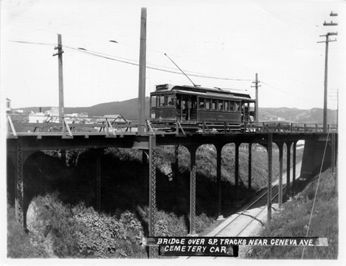 Bridge over Southern Pacific tracks near Geneva Avenue. Cemetery car.