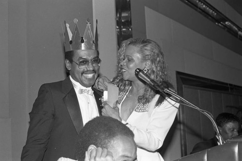 Black Business Association President Earl Cooper receiving a crown, Los Angeles, 1987