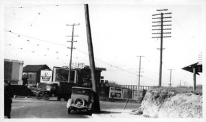 Looking westerly showing auto top against pole at 7th and Boyle Avenue, Los Angeles, 1928