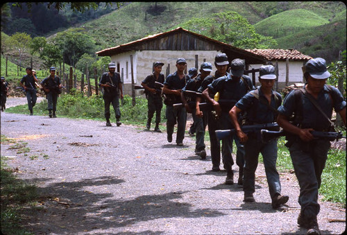 A group of Contra soldiers march in El Porvenir Farm, Nicaragua, 1983