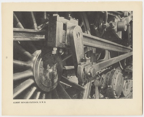 Untitled (Fore wheels and gears of a train)
