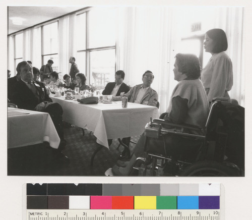 Kurt Lauridsen, Susan O'Hara and unidentified people sitting at a table