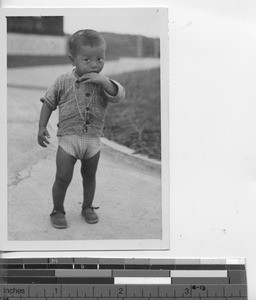 A child of a "House Boy" at the Maryknoll house at Hong Kong, China, 1939