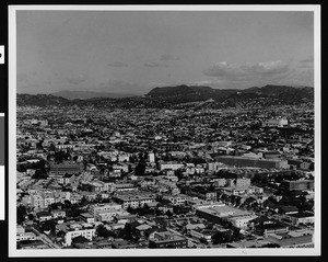 Birdseye view of Los Angeles, looking northwest towards Griffith Park from downtown, 1967