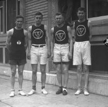 "Four Male Athletes, "S" and "Y"