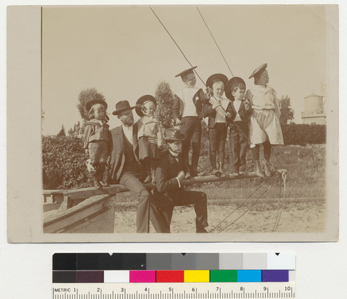 Unidentified group (family?) portrait, children on the prow of a boat