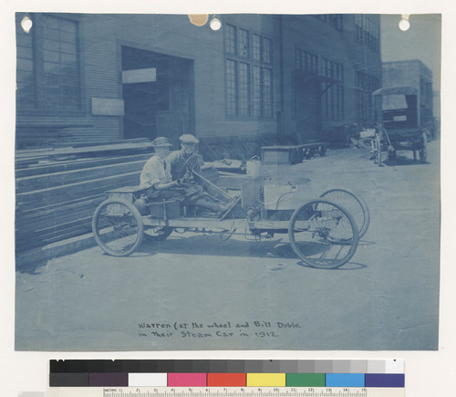 Warren at the wheel and Bill Doble in their steam car in 1912