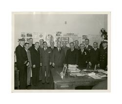 Isidore B. Dockweiler with civilians and naval officers, early 1940s