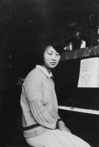 Korean American woman at piano