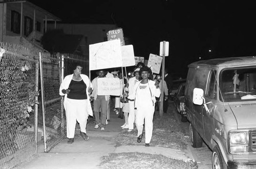 Neighborhood watch group marching against drugs and crime, Los Angeles, 1986
