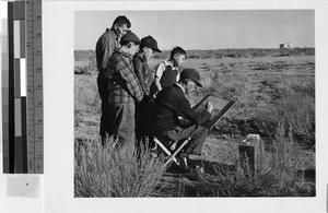 Artist at work at Granada Japanese Relocation Camp, Amache, Colorado, December 13, 1942