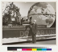 Robert Dollar in front of Dollar Line float for the Harbor Day Parade
