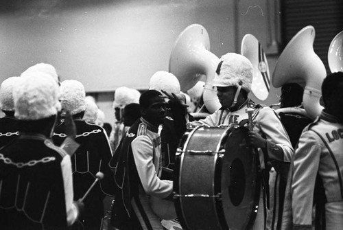 Locke High School students preparing to compete in a LAUSD Band and Drill Team Championship, Los Angeles, 1983