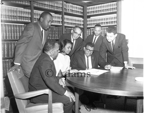 Men and woman in Law Office, Los Angeles, 1964