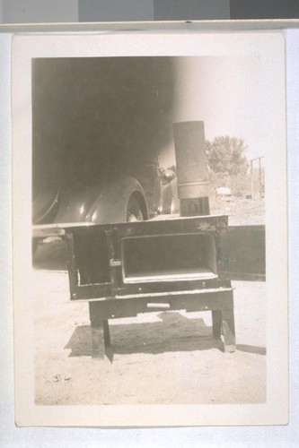 Spring, 1935, Hooverville, Kern County. On highway north of Bakersfield. Hand made camp stove. (See other picture)