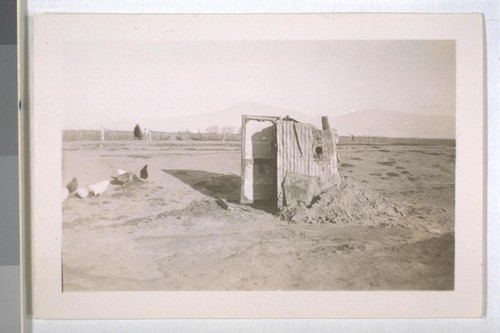 Spring, 1936, Kern County. A makeshift privy serving squatters in a camp near Weedpatch