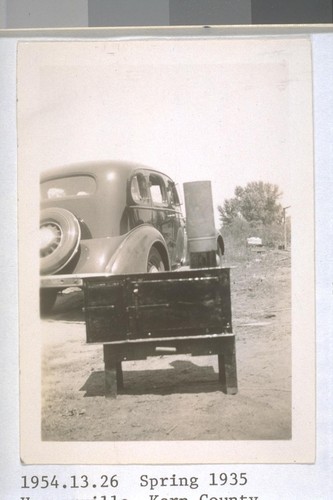 Spring, 1935, Hooverville, Kern County. On highway north of Bakersfield. Hand made camp stove (See other picture)