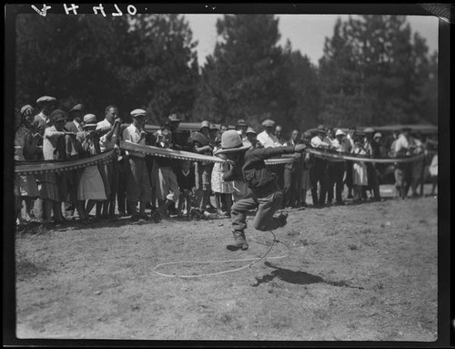 Rodeo performer doing rope trick, Lake Arrowhead Rodeo, Lake Arrowhead, 1929