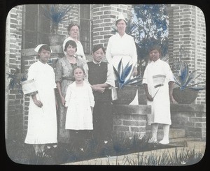 Nurses standing together outdoors, China, ca.1917-1923