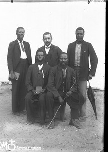 Arnold Borel with a group of African men, Makulane, Mozambique, ca. 1896-1911