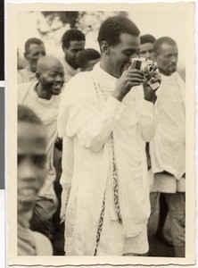Pastor Dafaa makes a snapshot and being snapped himself, Ayra, Ethiopia, 1952