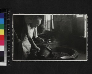 Portrait of man working in cookhouse in internment camp, Shanghai Shi, China, ca. 1944