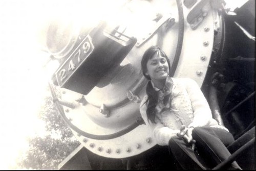 Patricia Whiting in front of a train