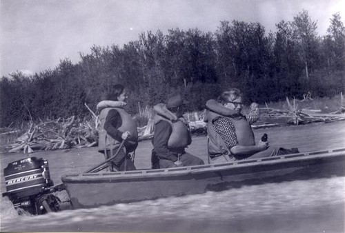 Patricia Whiting, the Speaker of the House, and a National Guard trooper on a boat