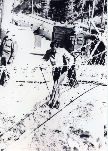 Patricia Whiting on a rope bridge