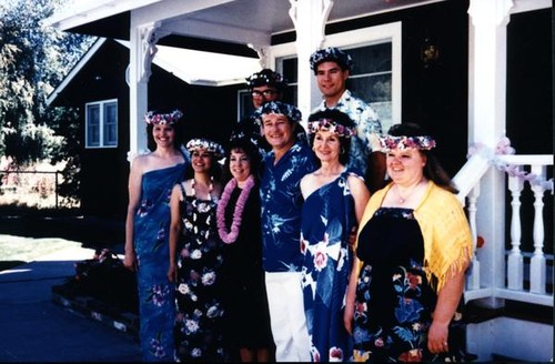 Group portrait of Vince and Patricia Whiting with family at their third wedding