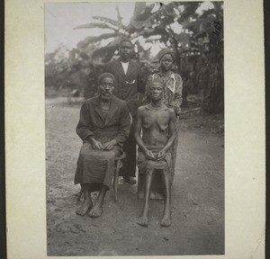 Henoch Mukonga, a teacher, with his parents and sister