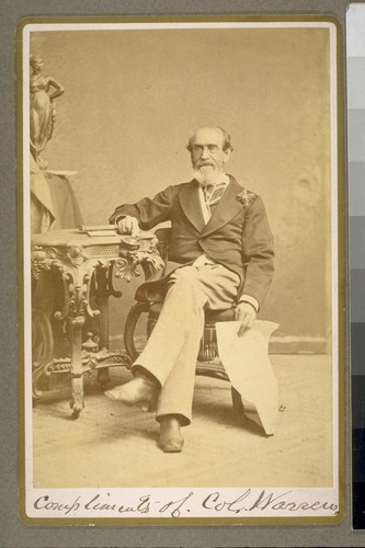 [Portrait of James Lloyd Lafayette Warren seated at desk.]