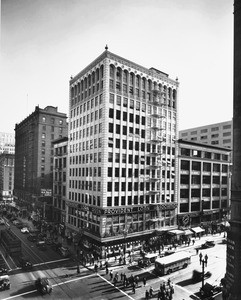 Corner view of the Cutts Building (formerly Sun Building) located at the corner of Hill Street and Seventh Street with the Roosevelt Loan Association located on the lower levels