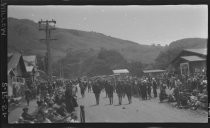 People on the road at the finish of girl's race, 1921