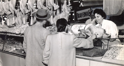 [Customers choosing a turkey from one of four poultry shops in the Crystal Palace Market]