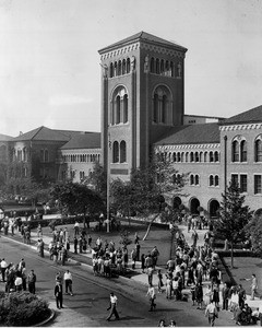A high-angle view of many students crowded in front of the Bovard Auditorium in the University of Southern California (USC)