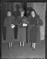 Elizabeth Gross, Alice Burr, and Frances Richards Collins plan for a benefit fashion show luncheon, Los Angeles, 1936