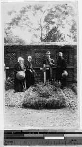Clergy visiting a grave, Shanghai, China, 1924