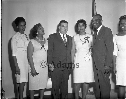 Senator Pierre among group members, Los Angeles, 1963