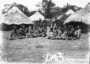 African people sitting in front of huts, Lemana, Limpopo, South Africa, ca. 1906-1915