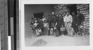 Group portrait of a Maryknoll priest and Guatemalan men, Guatemala, ca. 1946