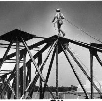 Ironworker is seen here hauling cables atop a steel beam for the California State Capitol restoration project