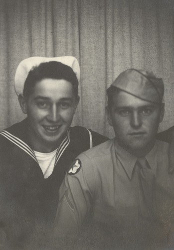 Jerry Owens in naval uniform, and Tommy Roussel in army uniform