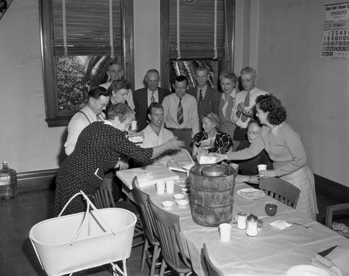 Jurors for the George "Bud" Gollum and Beulah Louise Overall murder trial hold an ice cream party in the jury room,1947
